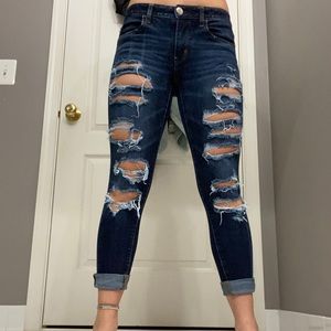 Dark blue ripped jeans